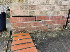 Crack in external wall render, a common sign raised in building surveys