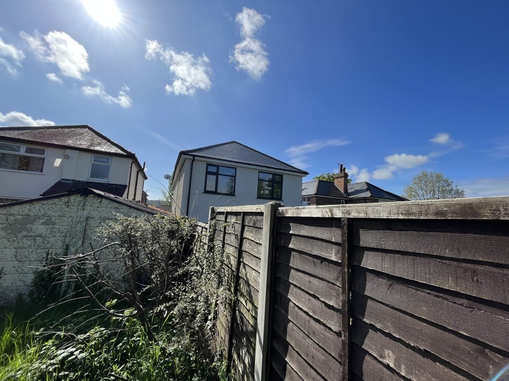 Boundary fence between two neighbouring gardens, the subject of a party wall matter