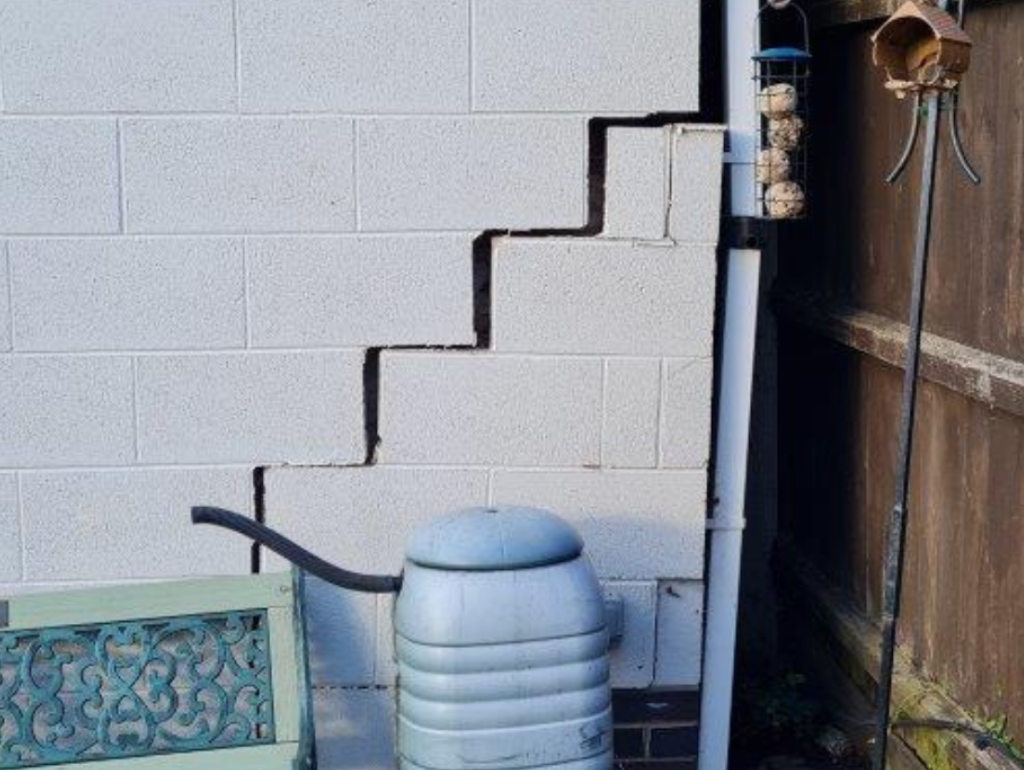 Stepped diagonal crack in blockwork, a classic sign of subsidence